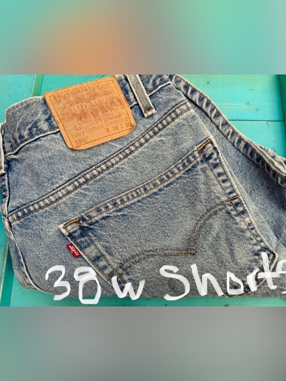 Four size 38 men’s shorts. Levi’s, George Norman, Puritan